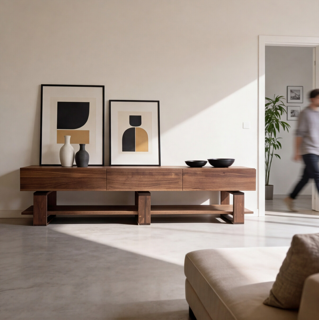 Bodhi American walnut TV unit with drawers and shelf in a modern living room


